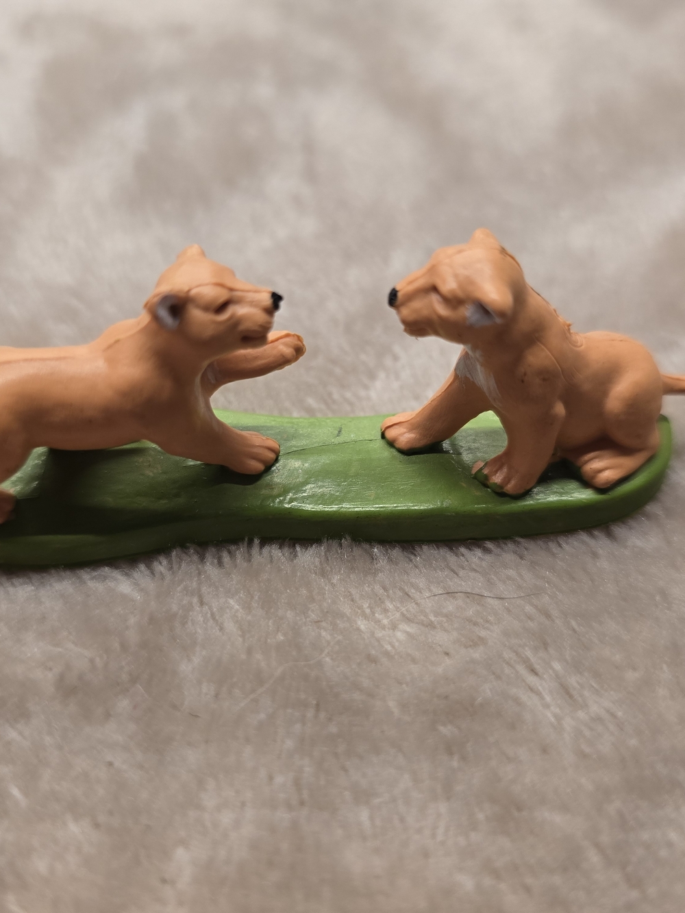 Pair of Tan Lion Cub Figurines on Green Base